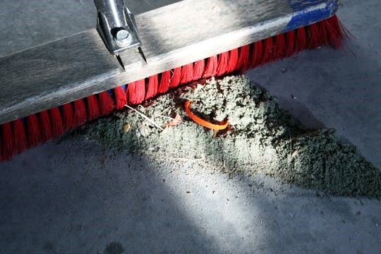 Cleaning dusty concrete